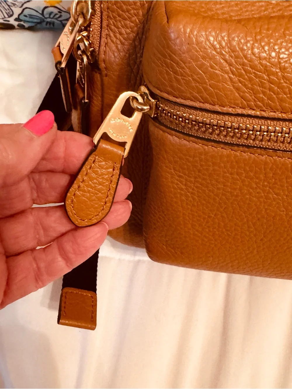 Coach Charlie medium size pebble leather backpack.